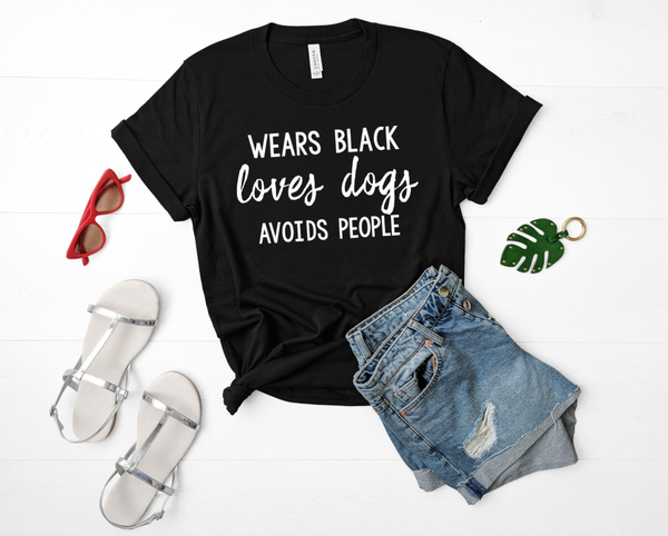 WEARS BLACK LOVES DOGS AVOIDS PEOPLE